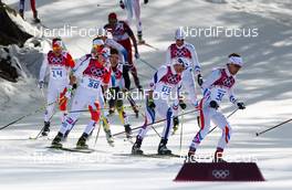 23.02.2014, Sochi, Russia (RUS): Ivan Boiteux Perillat (FRA), Rossignol, Swix, Rottefella, One Way followed by Martin Bajcicak (SVK), Fischer, One Way, Salomon and Graeme Killick (CAN), Fischer, Swix, Rottefella, One Way - XXII. Olympic Winter Games Sochi 2014, cross-country, 50km men, Sochi (RUS). www.nordicfocus.com. © NordicFocus. Every downloaded picture is fee-liable.