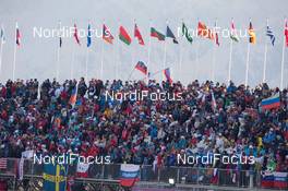 11.02.2014, Sochi, Russia (RUS): Event Feature: Fans with flags in the grandstand - XXII. Olympic Winter Games Sochi 2014, cross-country, individual sprint, Sochi (RUS). www.nordicfocus.com. © NordicFocus. Every downloaded picture is fee-liable.