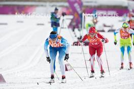 19.02.2014, Sochi, Russia (RUS): Aino Kaisa Saarinen (FIN), Sylwia Jaskowiec (POL) - XXII. Olympic Winter Games Sochi 2014, cross-country, team sprint, Sochi (RUS). www.nordicfocus.com. © NordicFocus. Every downloaded picture is fee-liable.