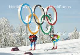 19.02.2014, Sochi, Russia (RUS): Anastasia Dotsenko (RUS), Alenka Cebasek (SLO), (l-r) - XXII. Olympic Winter Games Sochi 2014, cross-country, team sprint, Sochi (RUS). www.nordicfocus.com. © NordicFocus. Every downloaded picture is fee-liable.