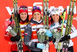 30.11.2014, Ruka, Finland (FIN): (l-r) Marit Bjoergen (NOR), Fischer, Swix, Rottefella, Therese Johaug (NOR), Fischer, Swix, Rottefella and Charlotte Kalla (SWE), Fischer, One Way, Rottefella, Craft - FIS world cup cross-country, 10km women, Ruka (FIN). www.nordicfocus.com. © Laiho/NordicFocus. Every downloaded picture is fee-liable.