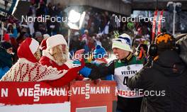 30.11.2014, Ruka, Finland (FIN): Iivo Niskanen (FIN), and Santa Claus - FIS world cup cross-country, 15km men, Ruka (FIN). www.nordicfocus.com. © Felgenhauer/NordicFocus. Every downloaded picture is fee-liable.