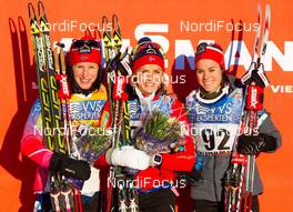 06.12.2014, Lillehammer, Norway (NOR): (l-r) Marit Bjoergen (NOR), Fischer, Swix, Rottefella, Therese Johaug (NOR), Fischer, Swix, Rottefella and Heidi Weng (NOR), Madshus, Swix, Rottefella - FIS world cup cross-country, 5km women, Lillehammer (NOR). www.nordicfocus.com. © Laiho/NordicFocus. Every downloaded picture is fee-liable.