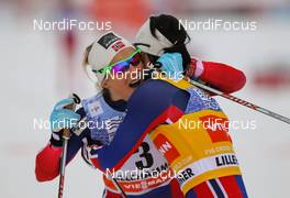 07.12.2014, Lillehammer, Norway (NOR): (l-r) Therese Johaug (NOR), Fischer, Swix, Rottefella and Marit Bjoergen (NOR), Fischer, Swix, Rottefella - FIS world cup cross-country, pursuit women, Lillehammer (NOR). www.nordicfocus.com. © Laiho/NordicFocus. Every downloaded picture is fee-liable.