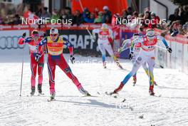 21.12.2014, Davos, Switzerland (SUI): (l-r) Marit Bjoergen (NOR), Fischer, Swix, Rottefella and Stina Nilsson (SWE), Fischer, Alpina, Craft - FIS world cup cross-country, individual sprint, Davos (SUI). www.nordicfocus.com. © Laiho/NordicFocus. Every downloaded picture is fee-liable.
