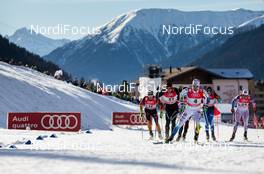 21.12.2014, Davos, Switzerland (SUI): Emil Joensson (SWE), Fischer, Swix, Rottefella, Craft followed by Kindschi Joeri (SUI), Fischer, Swix, Rottefella, Odlo  - FIS world cup cross-country, individual sprint, Davos (SUI). www.nordicfocus.com. © Laiho/NordicFocus. Every downloaded picture is fee-liable.