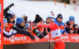 21.12.2014, Davos, Switzerland (SUI): italian team congratulating Federico Pellegrino (ITA), Rossignol, Rottefella - FIS world cup cross-country, individual sprint, Davos (SUI). www.nordicfocus.com. © Laiho/NordicFocus. Every downloaded picture is fee-liable.