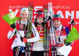 21.12.2014, Davos, Switzerland (SUI): (l-r) Stina Nilsson (SWE), Fischer, Alpina, Craft, Marit Bjoergen (NOR), Fischer, Swix, Rottefella and Ingvild Flugstad Oestberg (NOR), Madshus, Swix, Rottefella - FIS world cup cross-country, individual sprint, Davos (SUI). www.nordicfocus.com. © Laiho/NordicFocus. Every downloaded picture is fee-liable.