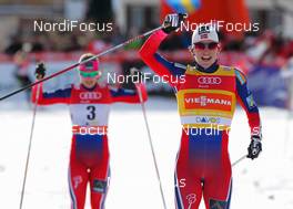 21.12.2014, Davos, Switzerland (SUI): (l-r) Ingvild Flugstad Oestberg (NOR), Madshus, Swix, Rottefella and Marit Bjoergen (NOR), Fischer, Swix, Rottefella - FIS world cup cross-country, individual sprint, Davos (SUI). www.nordicfocus.com. © Laiho/NordicFocus. Every downloaded picture is fee-liable.
