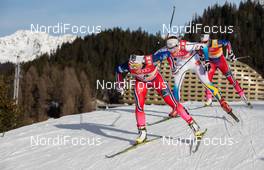 21.12.2014, Davos, Switzerland (SUI): Maiken Caspersen Falla (NOR), Fischer, Swix, Rottefella  followed by Stina Nilsson (SWE), Fischer, Alpina, Craft and Marit Bjoergen (NOR), Fischer, Swix, Rottefella - FIS world cup cross-country, individual sprint, Davos (SUI). www.nordicfocus.com. © Laiho/NordicFocus. Every downloaded picture is fee-liable.