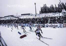 07.01.2015, Oberhof, Germany (GER): Luise Kummer (GER) leads the field in the first corner - IBU world cup biathlon, relay women, Oberhof (GER). www.nordicfocus.com. © Manzoni/NordicFocus. Every downloaded picture is fee-liable.