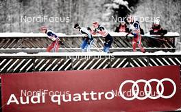05.12.2014, Lillehammer, Norway (NOR): athletes pass by an Audi banner - FIS world cup cross-country, individual sprint, Lillehammer (NOR). www.nordicfocus.com. © Felgenhauer/NordicFocus. Every downloaded picture is fee-liable.