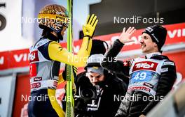 04.01.2015, Innsbruck, Austria (AUT): (l-r) Noriaki Kasai (JPN), Fischer and Simon Ammann (SUI), Fischer - FIS world cup ski jumping, four hills tournament, individual HS130, Innsbruck (AUT). www.nordicfocus.com. © Laiho/NordicFocus. Every downloaded picture is fee-liable.