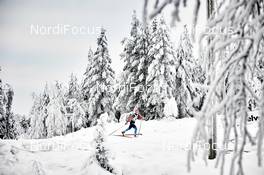 30.11.2014, Ruka, Finland (FIN): Natalia Korosteleva (RUS),  racing in white woods - FIS world cup cross-country, 10km women, Ruka (FIN). www.nordicfocus.com. © Felgenhauer/NordicFocus. Every downloaded picture is fee-liable.