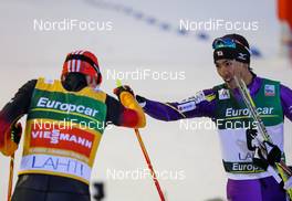 28.02.2014, Lahti, Finland (FIN): (l-r) Eric Frenzel (GER), Fischer, Leki, Rottefella, Adidas and Akito Watabe (JPN), Fischer, Swix, Rottefella - FIS world cup nordic combined, individual gundersen HS130/10km, Lahti (FIN). www.nordicfocus.com. © Laiho/NordicFocus. Every downloaded picture is fee-liable.