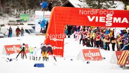 21.12.2014, Ramsau, Austria (AUT): a group of athletes and coaches and a viessmann arch - FIS world cup nordic combined, individual gundersen HS98/10km, Ramsau (AUT). www.nordicfocus.com. © Felgenhauer/NordicFocus. Every downloaded picture is fee-liable.