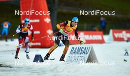 20.12.2014, Ramsau, Austria (AUT): Lukas Klapfer (AUT), Tino Edelmann (GER), (l-r)  - FIS world cup nordic combined, team sprint HS98/2x7.5km, Ramsau (AUT). www.nordicfocus.com. © Felgenhauer/NordicFocus. Every downloaded picture is fee-liable.