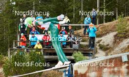 20.12.2014, Ramsau, Austria (AUT):  ski jumper in front of coaches - FIS world cup nordic combined, team sprint HS98/2x7.5km, Ramsau (AUT). www.nordicfocus.com. © Felgenhauer/NordicFocus. Every downloaded picture is fee-liable.