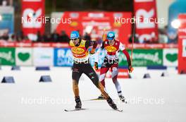 20.12.2014, Ramsau, Austria (AUT): Tino Edelmann (GER), Lukas Klapfer (AUT), (l-r)  - FIS world cup nordic combined, team sprint HS98/2x7.5km, Ramsau (AUT). www.nordicfocus.com. © Felgenhauer/NordicFocus. Every downloaded picture is fee-liable.