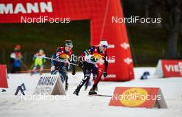 20.12.2014, Ramsau, Austria (AUT): Matti Herola (FIN), Adam Loomis (USA), (l-r)  - FIS world cup nordic combined, team sprint HS98/2x7.5km, Ramsau (AUT). www.nordicfocus.com. © Felgenhauer/NordicFocus. Every downloaded picture is fee-liable.