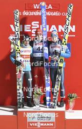 16.01.2014, Wisla, Poland (POL): podium, l-r, Kamil Stoch (POL), Fischer, Andreas Wellinger (GER), Fluege.de, Michael Hayboeck (AUT), Fischer - FIS world cup ski jumping, individual HS134, Wisla (POL). www.nordicfocus.com. © Domanski/NordicFocus. Every downloaded picture is fee-liable.