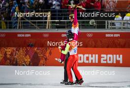 09.02.2014, Sochi, Russia (RUS): Kamil Stoch (POL), Fischer carried by Jan Ziobro (POL) and Maciej Kot (POL), Fischer - XXII. Olympic Winter Games Sochi 2014, ski jumping, individual HS106, Sochi (RUS). www.nordicfocus.com. © NordicFocus. Every downloaded picture is fee-liable.