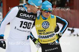 02.03.2014, Mora, Sweden (SWE): Team Colleague Mathias Fredriksson (SWE) cheers Seraina Boner (SUI) up at the finish - FIS Marathon Cup Vasaloppet, Mora (SWE). www.nordicfocus.com. © Rauschendorfer/NordicFocus. Every downloaded picture is fee-liable.