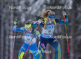 07.01.2015, Oberhof, Germany (GER): Mona Brorsson (SWE), Darya Yurlova (EST) - IBU world cup biathlon, relay women, Oberhof (GER). www.nordicfocus.com. © Manzoni/NordicFocus. Every downloaded picture is fee-liable.