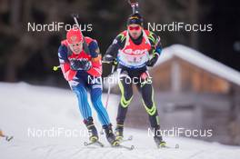 25.01.2015, Antholz, Italy (ITA): Evgeniy Garanichev (RUS), Simon Fourcade (FRA) - IBU world cup biathlon, relay men, Antholz (ITA). www.nordicfocus.com. © Manzoni/NordicFocus. Every downloaded picture is fee-liable.