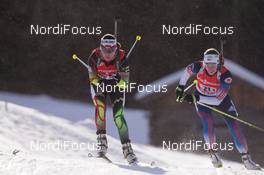 25.01.2015, Antholz, Italy (ITA): Nadezhda Skardino (BLR), Susan Dunklee (USA) - IBU world cup biathlon, relay women, Antholz (ITA). www.nordicfocus.com. © Manzoni/NordicFocus. Every downloaded picture is fee-liable.