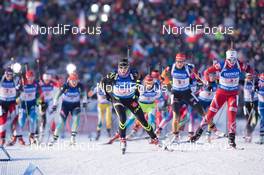 06.02.2015, Nove Mesto, Czech Republic (CZE): Enora Latuilliere (FRA) leads the field out of the stadium - IBU world cup biathlon, single mixed relay, Nove Mesto (CZE). www.nordicfocus.com. © Manzoni/NordicFocus. Every downloaded picture is fee-liable.