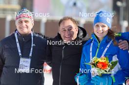 07.02.2015, Nove Mesto, Czech Republic (CZE): Jim Carrabre (CAN) IBU vice president responsible for medical issues with Milan Stech (CZE), chairman of the Czech Senat and a flower girl - IBU world cup biathlon, sprint women, Nove Mesto (CZE). www.nordicfocus.com. © Manzoni/NordicFocus. Every downloaded picture is fee-liable.