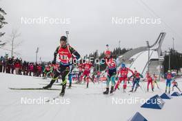 15.02.2015, Oslo, Norway (NOR): Simon Fourcade (FRA) leads the field at the start - IBU world cup biathlon Holmenkollen, relay men, Oslo (NOR). www.nordicfocus.com. © Manzoni/NordicFocus. Every downloaded picture is fee-liable.