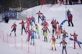 15.02.2015, Oslo, Norway (NOR): Simon Fourcade (FRA) lead the field over the bridge - IBU world cup biathlon Holmenkollen, relay men, Oslo (NOR). www.nordicfocus.com. © Manzoni/NordicFocus. Every downloaded picture is fee-liable.