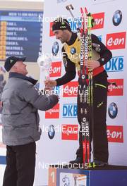 22.03.2015, Khanty-Mansiysk, Russia (RUS): Martin Fourcade (FRA), Anders Besseberg (NOR) president of International Biathlon Union, (l-r) - IBU world cup biathlon, cups, Khanty-Mansiysk (RUS). www.nordicfocus.com. © Manzoni/NordicFocus. Every downloaded picture is fee-liable.
