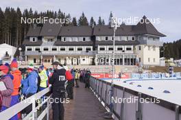 16.12.2015, Pokljuka, Slovenia (SLO): Event Feature: Coaches at the shooting range and the Sport Center Hotel at the back -  IBU world cup biathlon, training, Pokljuka (SLO). www.nordicfocus.com. © Manzoni/NordicFocus. Every downloaded picture is fee-liable.