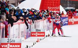 06.01.2015, Val Mustair, Switzerland (SUI): Ingvild Flugstad Oestberg (NOR), Marit Bjoergen (NOR), (l-r)  - FIS world cup cross-country, tour de ski, individual sprint, Val Mustair (SUI). www.nordicfocus.com. © Felgenhauer/NordicFocus. Every downloaded picture is fee-liable.