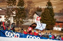 06.01.2015, Val Mustair, Switzerland (SUI): suisse fans ans a coop banner - FIS world cup cross-country, tour de ski, individual sprint, Val Mustair (SUI). www.nordicfocus.com. © Felgenhauer/NordicFocus. Every downloaded picture is fee-liable.
