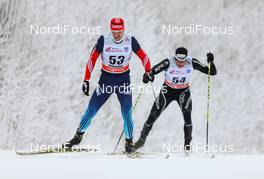 23.01.2015, Rybinsk, Russia (RUS): Sergey Ustiugov (RUS), Fischer, Swix, Rottefella, Adidas followed by Dario Cologna (SUI), Fischer, One Way, Rottefella, Odlo - FIS world cup cross-country, 15km men, Rybinsk (RUS). www.nordicfocus.com. © Laiho/NordicFocus. Every downloaded picture is fee-liable.