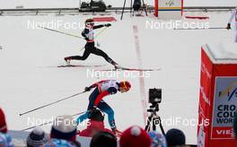24.01.2015, Rybinsk, Russia (RUS): foto finish between Natalia Matveeva (RUS), Fischer, Swix, Alpina, Rottefella, Adidas (front) and Laurien van der Graaff (SUI), Rossignol, One Way, Rottefella, Odlo (behind in the semi final - FIS world cup cross-country, individual sprint, Rybinsk (RUS). www.nordicfocus.com. © Laiho/NordicFocus. Every downloaded picture is fee-liable.