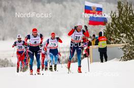 25.01.2015, Rybinsk, Russia (RUS): (l-r) Maxim Vylegzhanin (RUS), Fischer, Swix, Alpina, Rottefella, Adidas, Vladislav Skobelev (RUS), Fischer, Swix, Rottefella, Adidas and Dmitriy Japarov (RUS), Fischer, Swix, Alpina, Rottefella, Adidas - FIS world cup cross-country, skiathlon men, Rybinsk (RUS). www.nordicfocus.com. © Laiho/NordicFocus. Every downloaded picture is fee-liable.