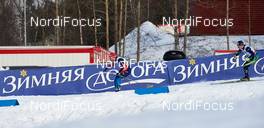 14.02.2015, Oestersund, Sweden (SWE):  Alexander Panzhinskiy (RUS), Nikolay Chebotko (KAZ) in front of Kristall advertisment - FIS world cup cross-country, individual sprint, Oestersund (SWE). www.nordicfocus.com. © Felgenhauer/NordicFocus. Every downloaded picture is fee-liable.