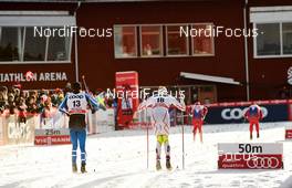 14.02.2015, Oestersund, Sweden (SWE): Ristomatti Hakola (FIN), Len Valjas (CAN), finishing in the backlight - FIS world cup cross-country, individual sprint, Oestersund (SWE). www.nordicfocus.com. © Felgenhauer/NordicFocus. Every downloaded picture is fee-liable.
