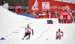 25.02.2015, Falun, Sweden (SWE): Dominik Baldauf (AUT), Michail Semenov (BLR), (l-r)  - FIS nordic world ski championships, cross-country, 15km men, Falun (SWE). www.nordicfocus.com. © NordicFocus. Every downloaded picture is fee-liable.