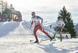 12.12.2015, Davos, Switzerland (SUI): Simen Andreas Sveen (NOR), Veselin Tsinzov (BUL), (l-r)  - FIS world cup cross-country, 30km men, Davos (SUI). www.nordicfocus.com. © Felgenhauer/NordicFocus. Every downloaded picture is fee-liable.