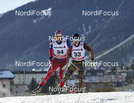 12.12.2015, Davos, Switzerland (SUI): Sjur Roethe (NOR), Markus Weeger (GER), (l-r)  - FIS world cup cross-country, 30km men, Davos (SUI). www.nordicfocus.com. © Felgenhauer/NordicFocus. Every downloaded picture is fee-liable.