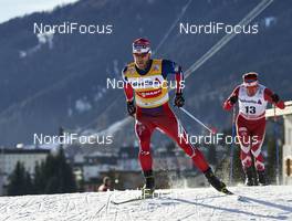 12.12.2015, Davos, Switzerland (SUI): Martin Johnsrud Sundby (NOR), Ivan Babikov (CAN), (l-r)  - FIS world cup cross-country, 30km men, Davos (SUI). www.nordicfocus.com. © Felgenhauer/NordicFocus. Every downloaded picture is fee-liable.