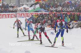 15.01.2016, Ruhpolding, Germany (GER): Jean Guillaume Beatrix (FRA) chasing a group into the stadium -  IBU world cup biathlon, relay men, Ruhpolding (GER). www.nordicfocus.com. © Manzoni/NordicFocus. Every downloaded picture is fee-liable.
