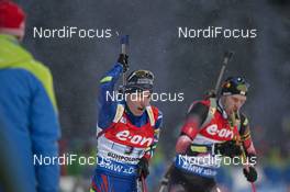 15.01.2016, Ruhpolding, Germany (GER): Quentin Fillon Maillet (FRA), Dominik Landertinger (AUT), (l-r) -  IBU world cup biathlon, relay men, Ruhpolding (GER). www.nordicfocus.com. © Manzoni/NordicFocus. Every downloaded picture is fee-liable.
