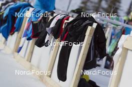 03.02.2016, Canmore, Canada (CAN): Event Feature: Athletes cloths hang over the racks -  IBU world cup biathlon, training, Canmore (CAN). www.nordicfocus.com. © Manzoni/NordicFocus. Every downloaded picture is fee-liable.